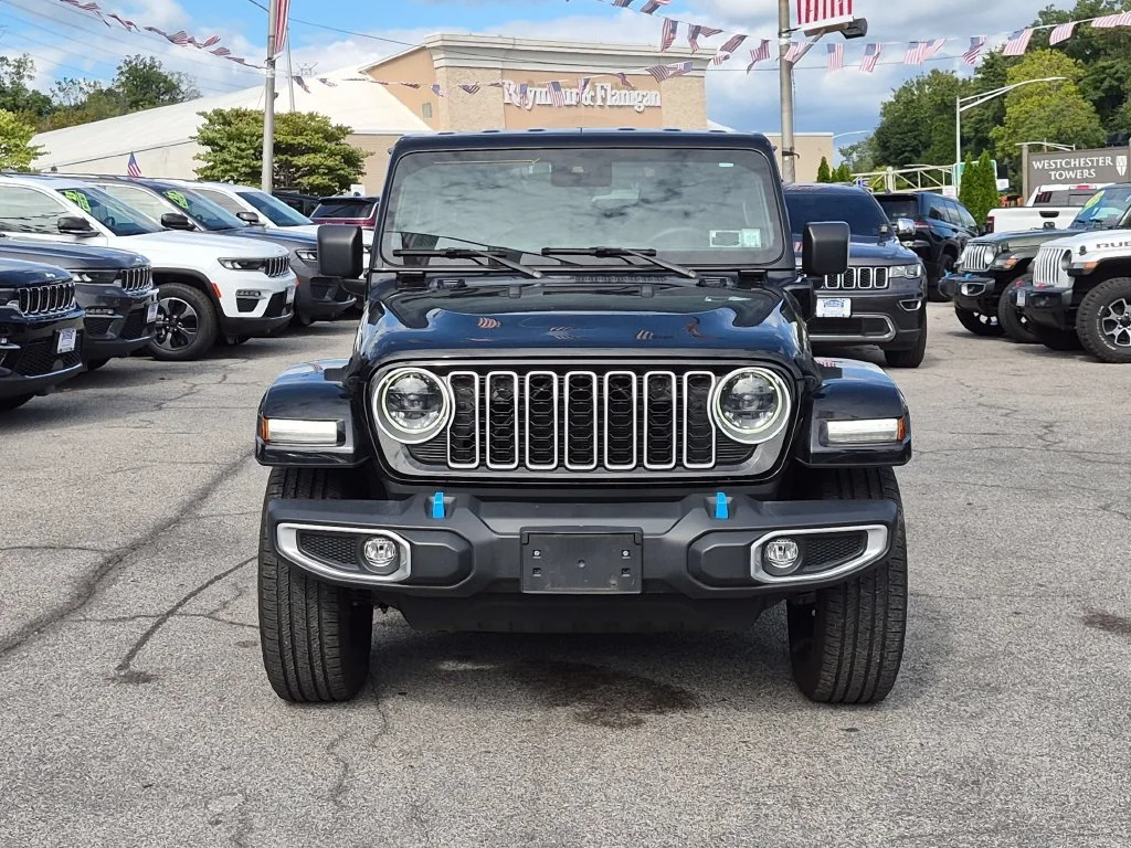 Used 2024 Black Jeep Sahara 4xe image 2