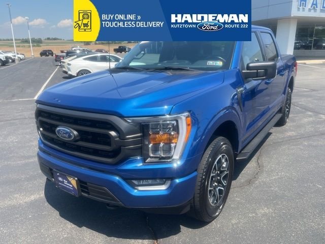 Certified Used 2023 Blue Metallic Ford XLT image 1