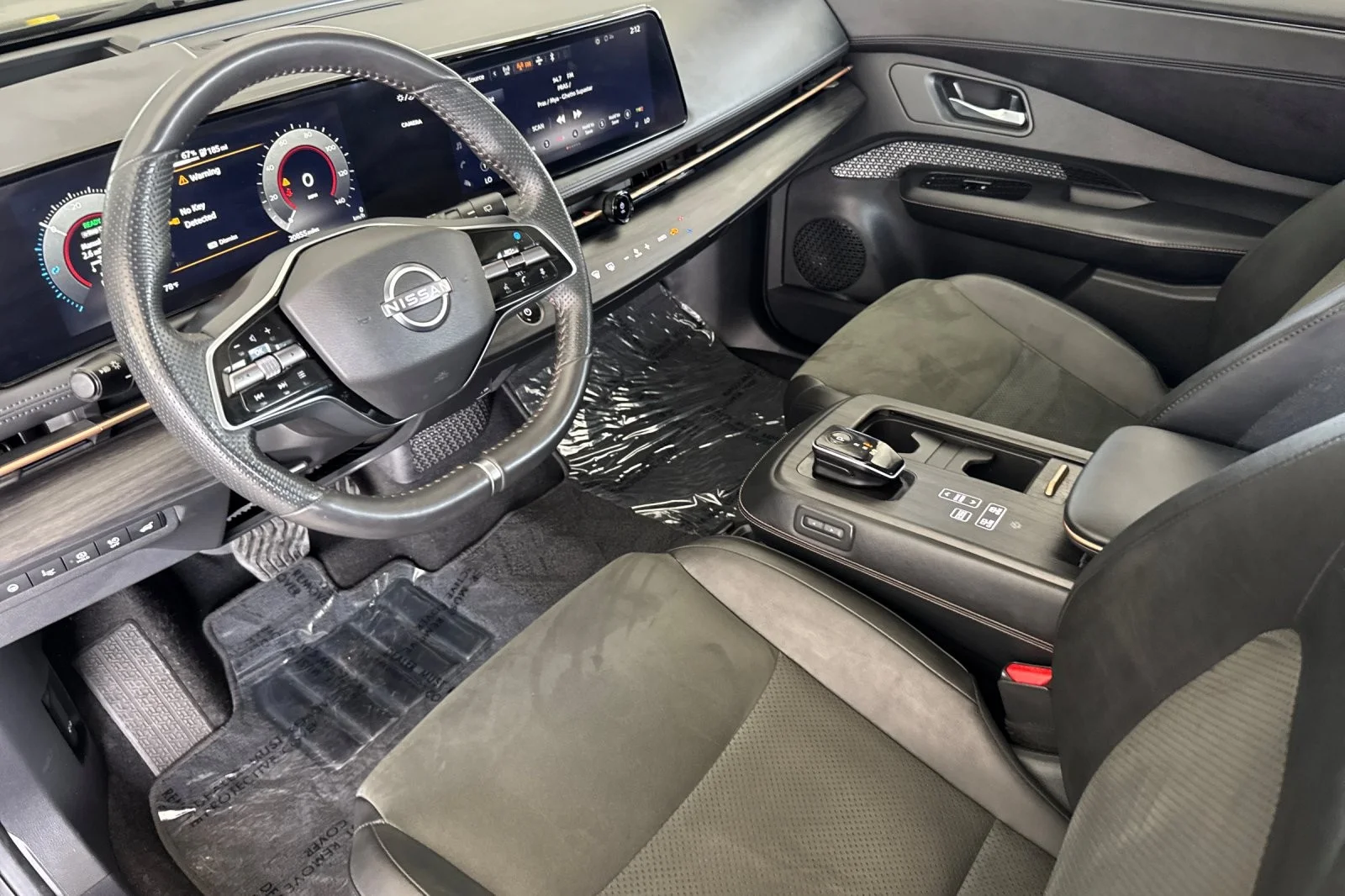 Used 2024 Black Diamond Pearl Nissan EVOLVE+ image 9