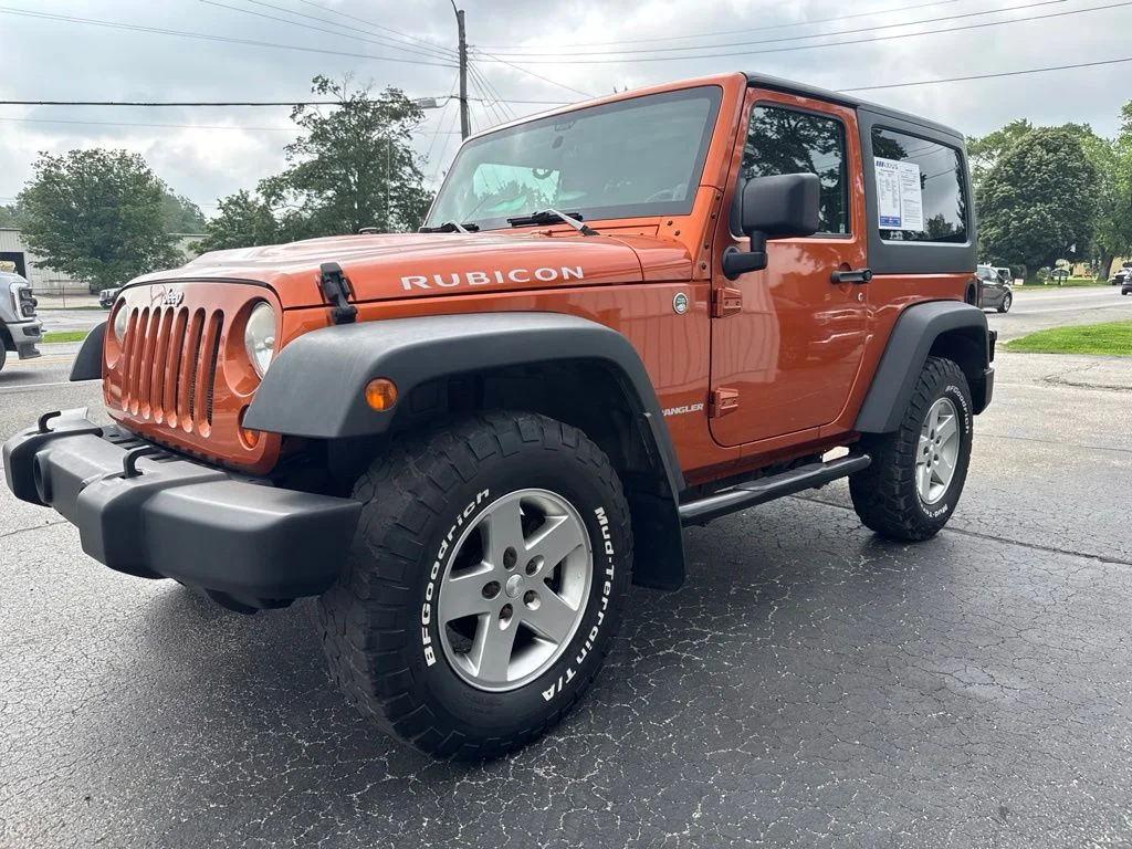 Used 2011 Orange Jeep Rubicon image 3
