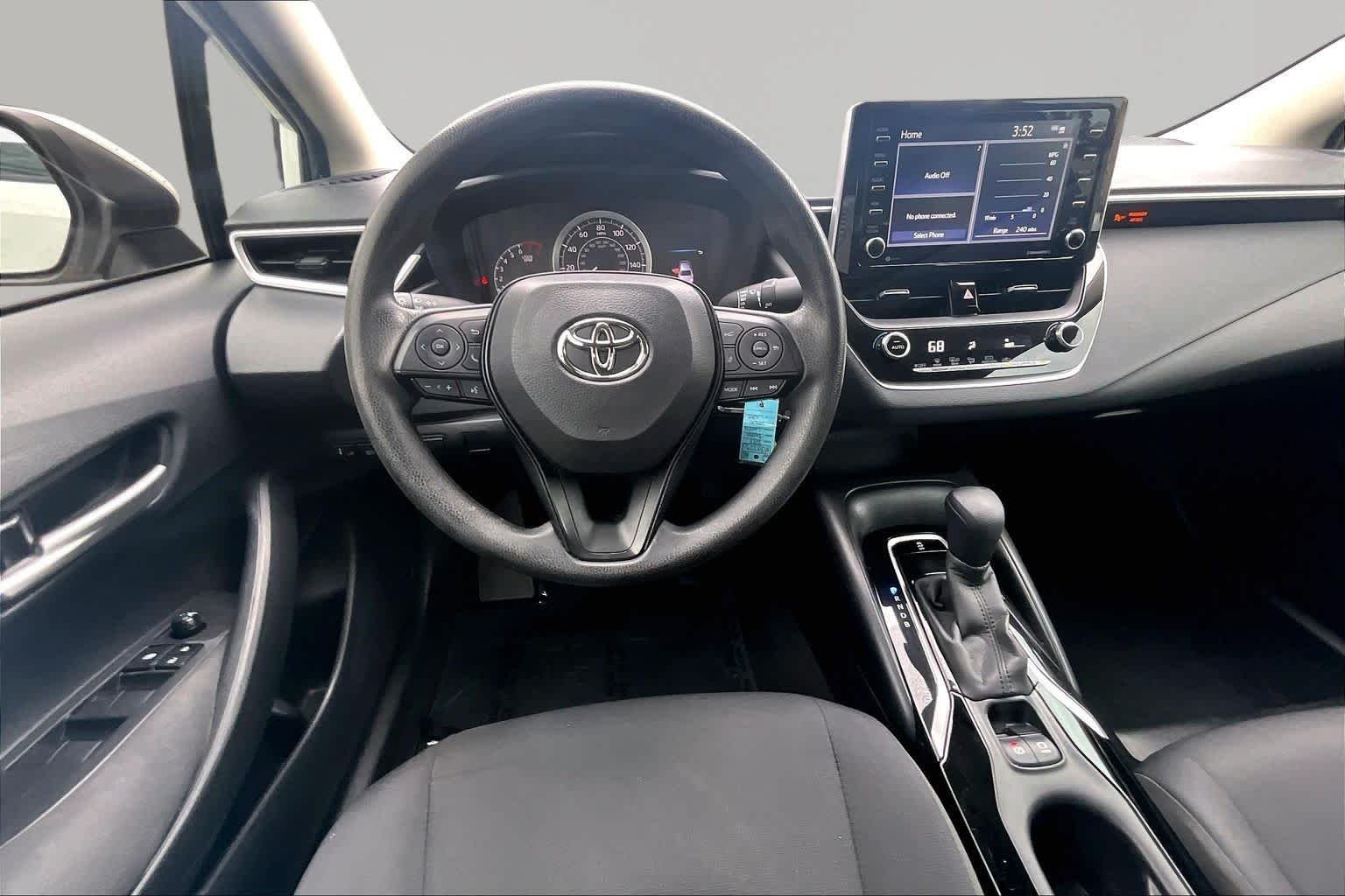Used 2021 Super White Toyota LE image 6