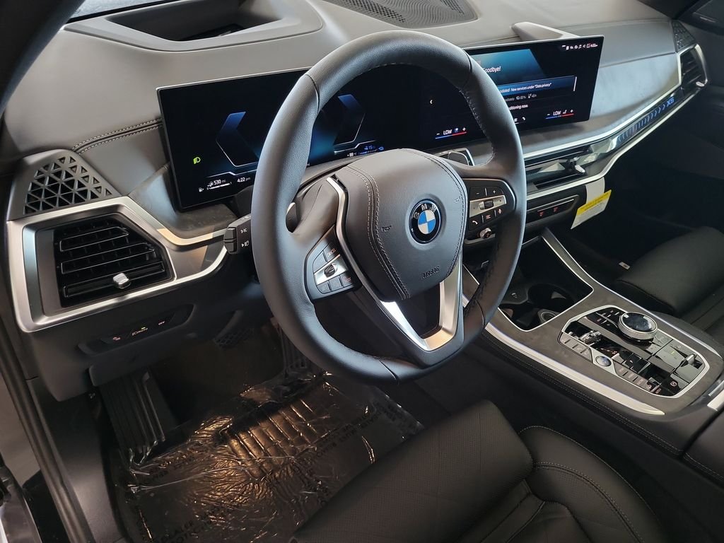 New 2026 Black Sapphire Metallic BMW xDrive50e image 13