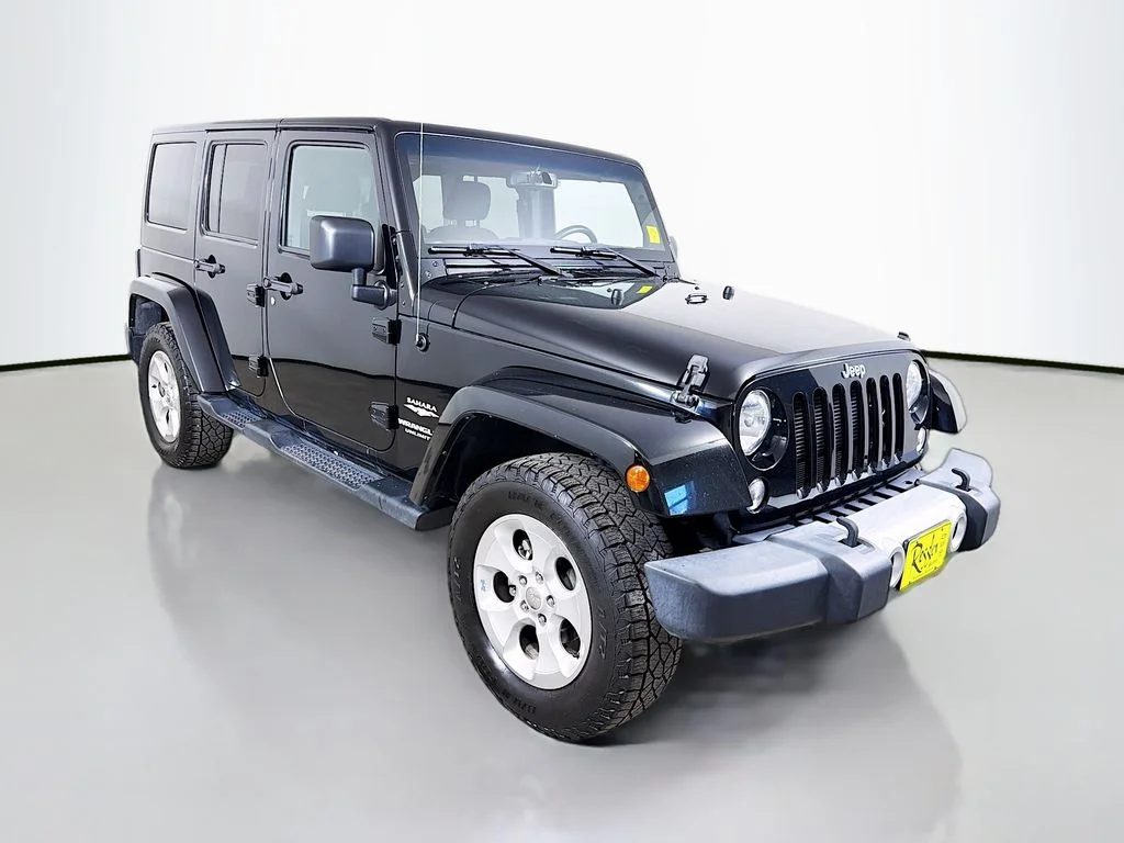 Used 2015 Black Jeep Unlimited Sahara image 4