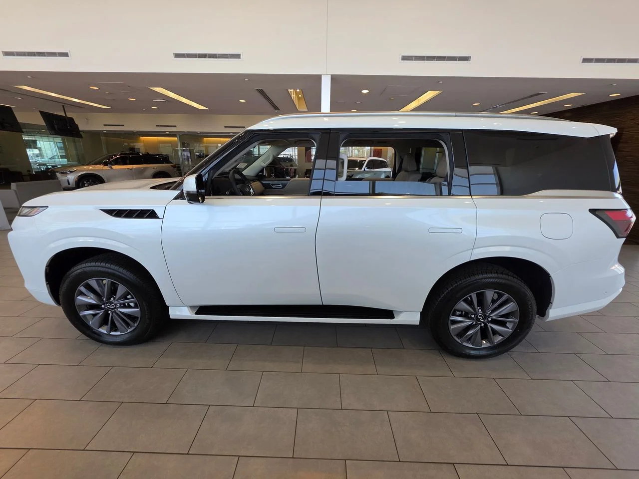 New 2026 RADIANT WHITE INFINITI Pure 4WD image 2