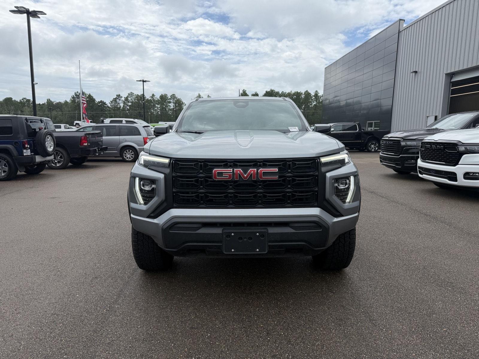 Used 2024 Summit White GMC 2WD Elevation image 2