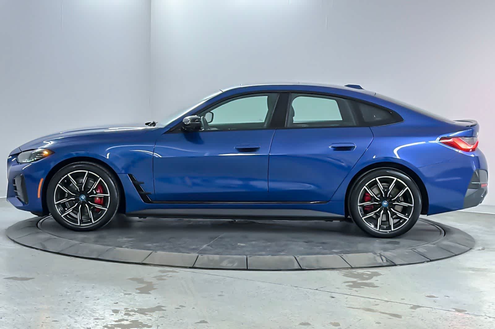 Used 2023 Portimao Blue Metallic BMW eDrive40 image 5