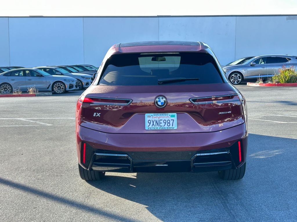 Used 2026 Red Metallic BMW xDrive45 image 4