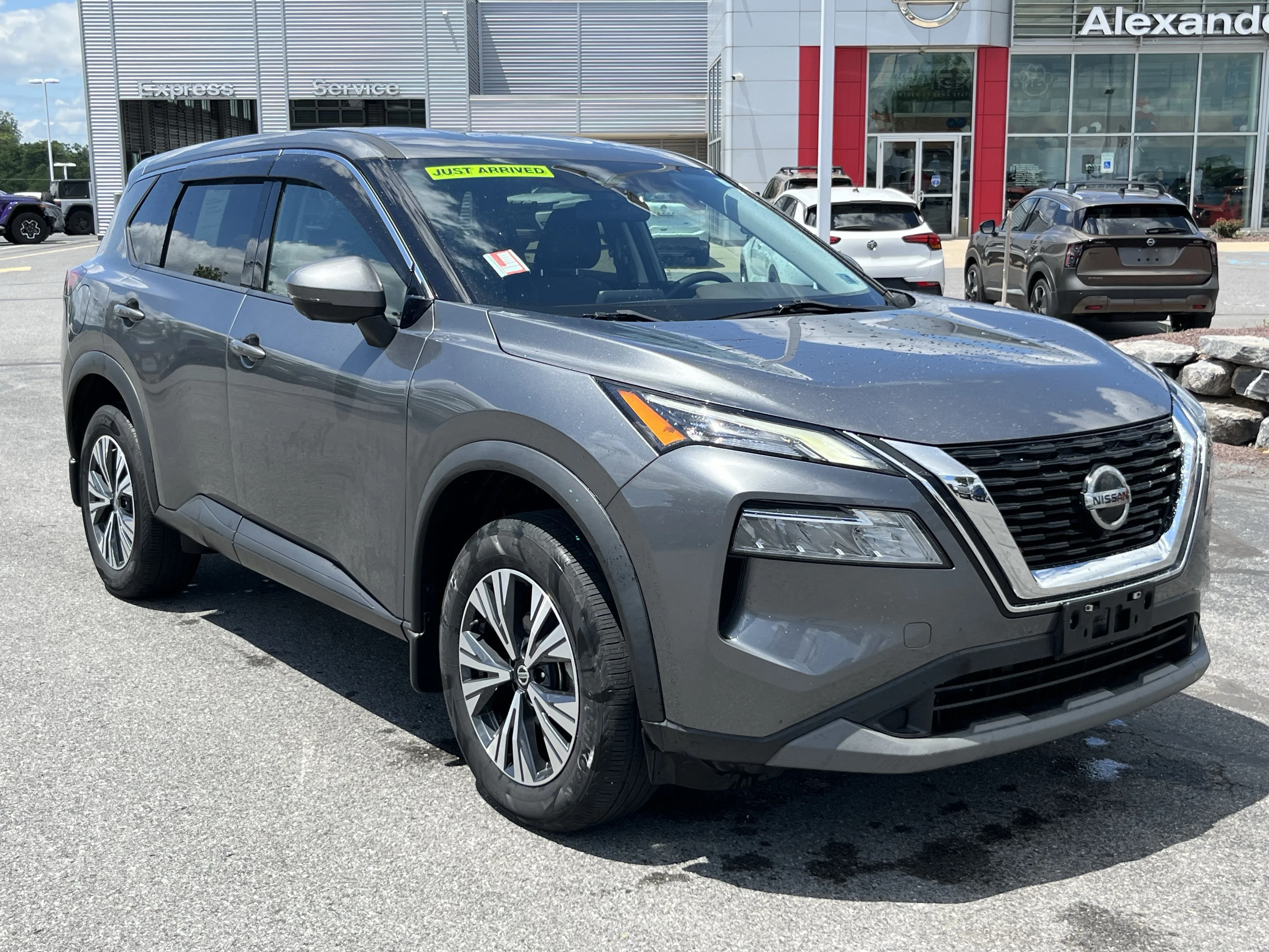 Used 2021 Gun Metallic Nissan SV image 1