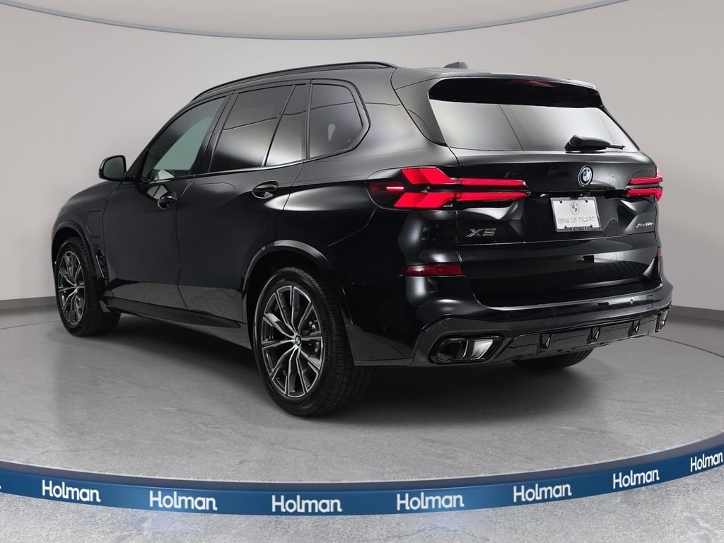 New 2026 Black Sapphire Metallic BMW xDrive50e image 7
