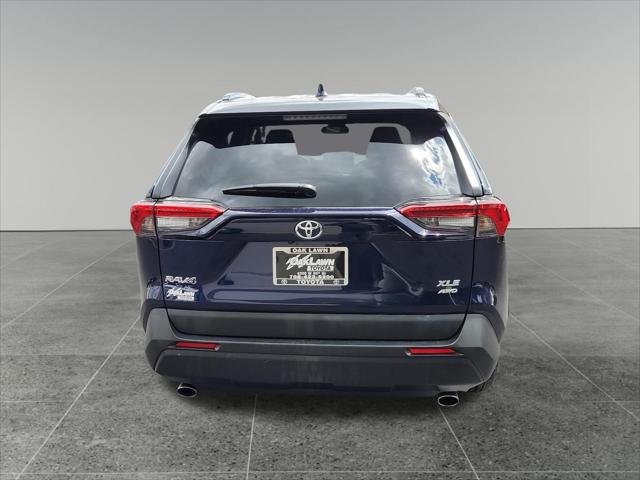 Certified Used 2025 DK. BLUE MC. Toyota  image 6