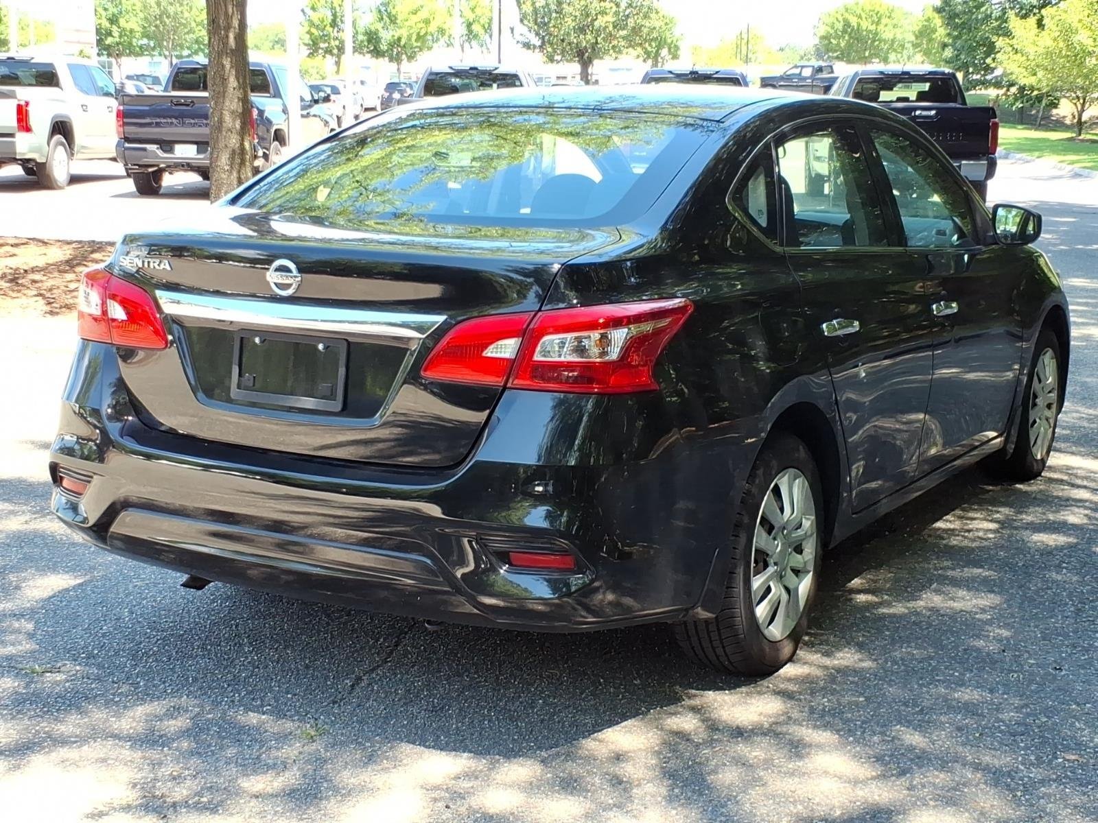 Used 2019 Super Black Nissan S image 6