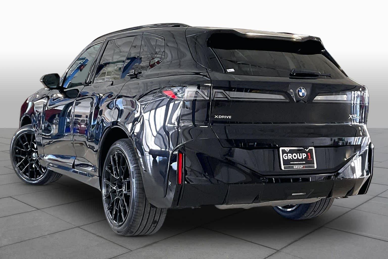 New 2027 Black Sapphire Metallic BMW 40 xDrive image 12