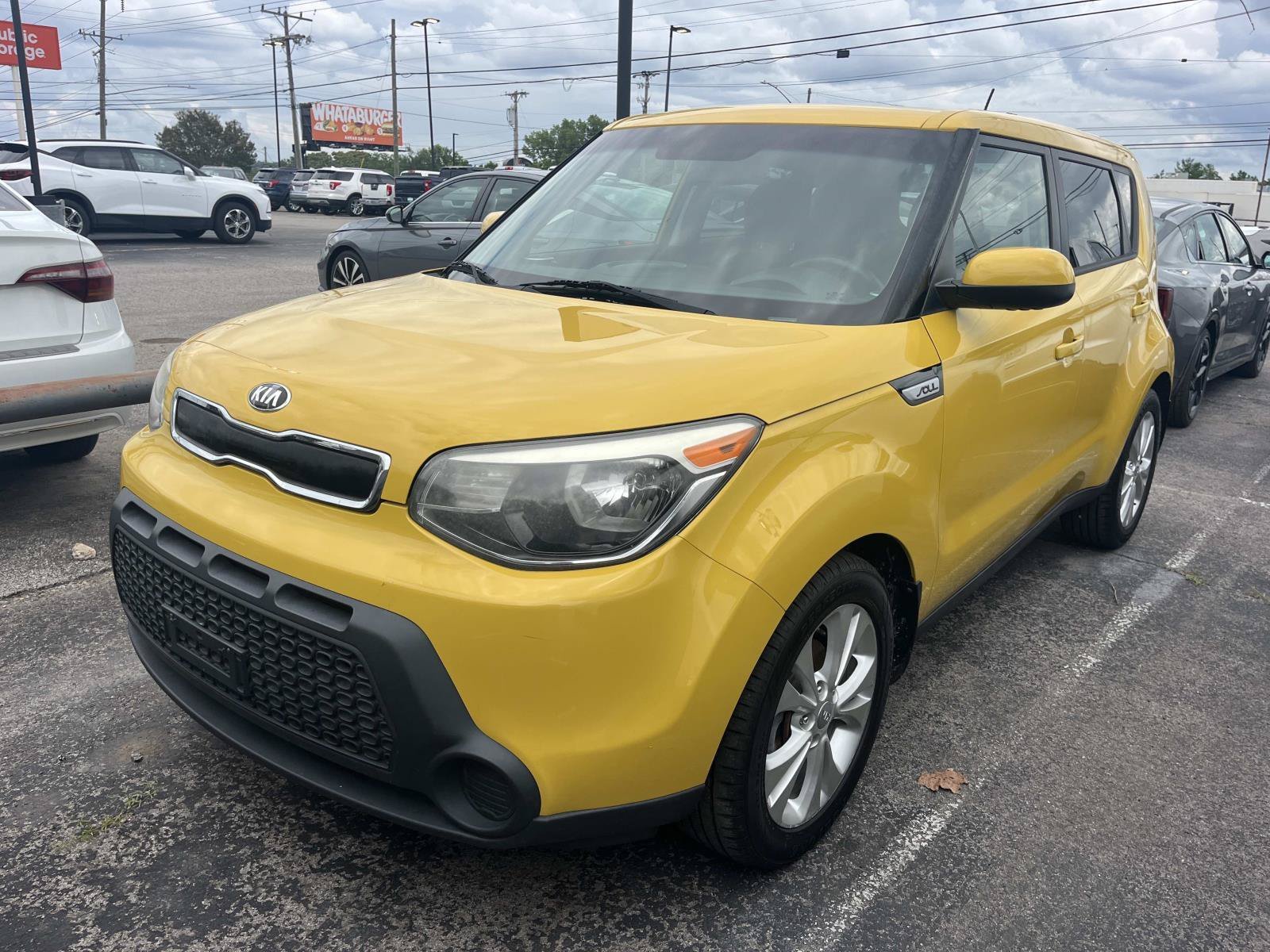 Used 2015 Solar Yellow Kia + image 2