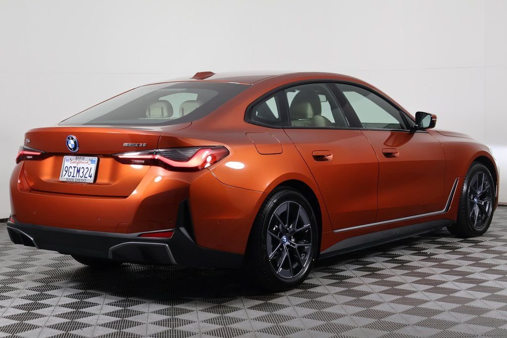 Certified Used 2023 Sunset Orange Metallic BMW eDrive35 image 4