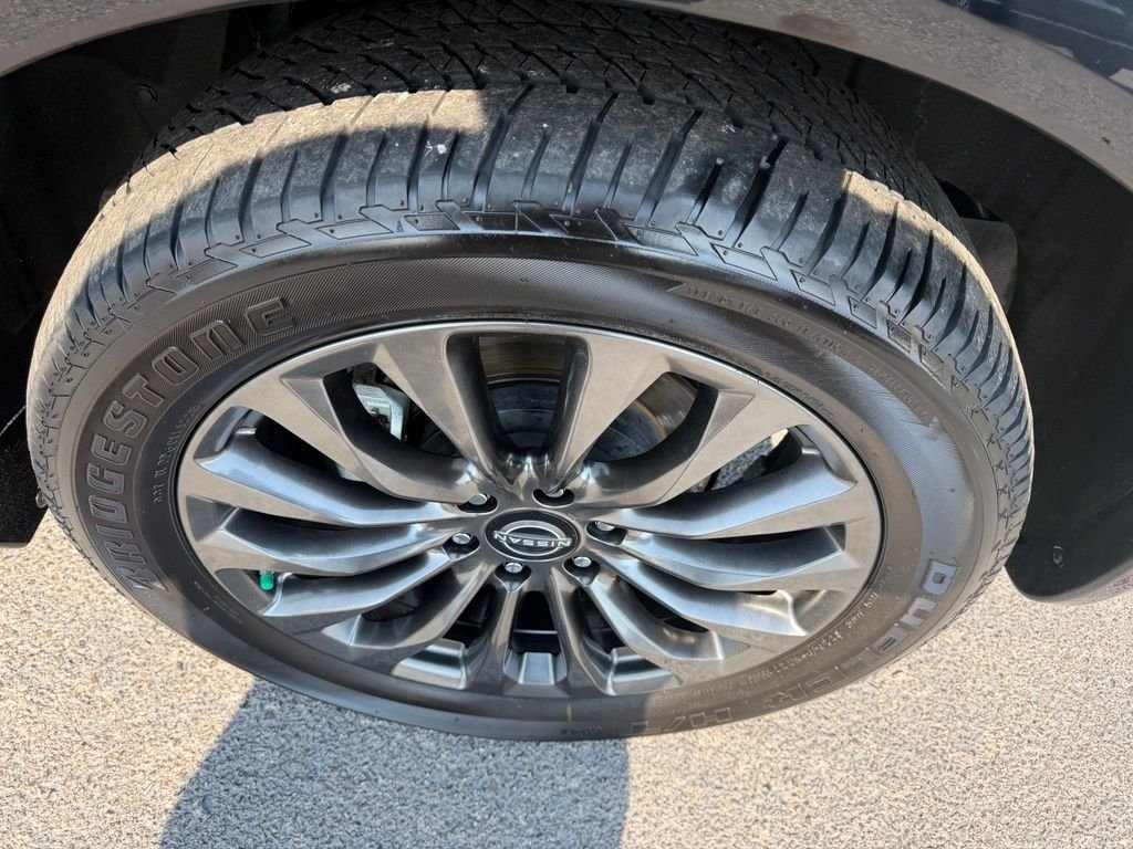 Certified Used 2024 Black Nissan Platinum image 10