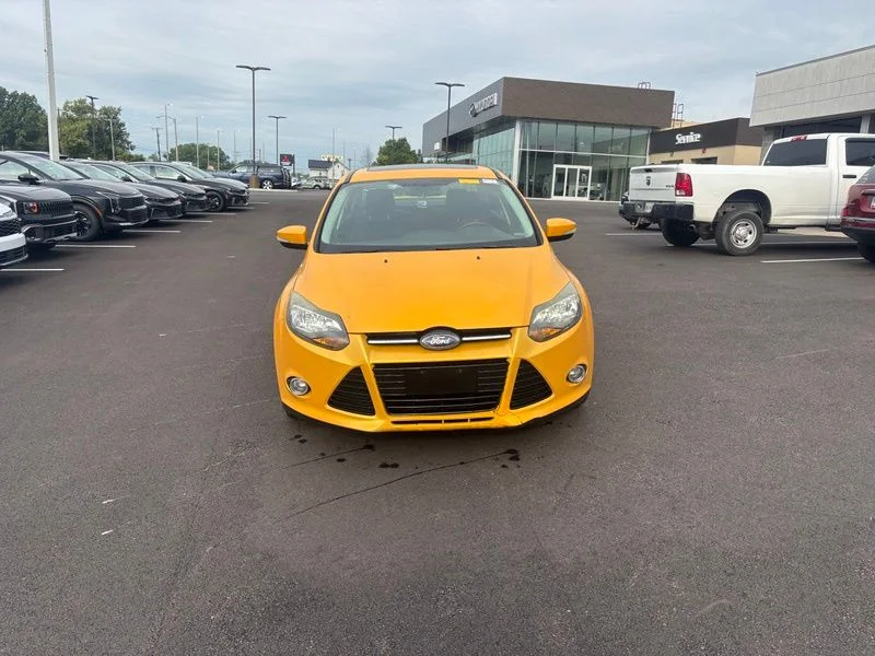 Used 2012 Yellow Ford Titanium image 2