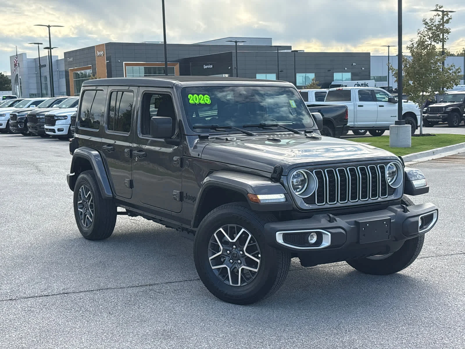 Used 2026 Jeep Wrangler 4-Door Sahara with VIN 1C4PJXEG8TW245284 for sale in Kansas City