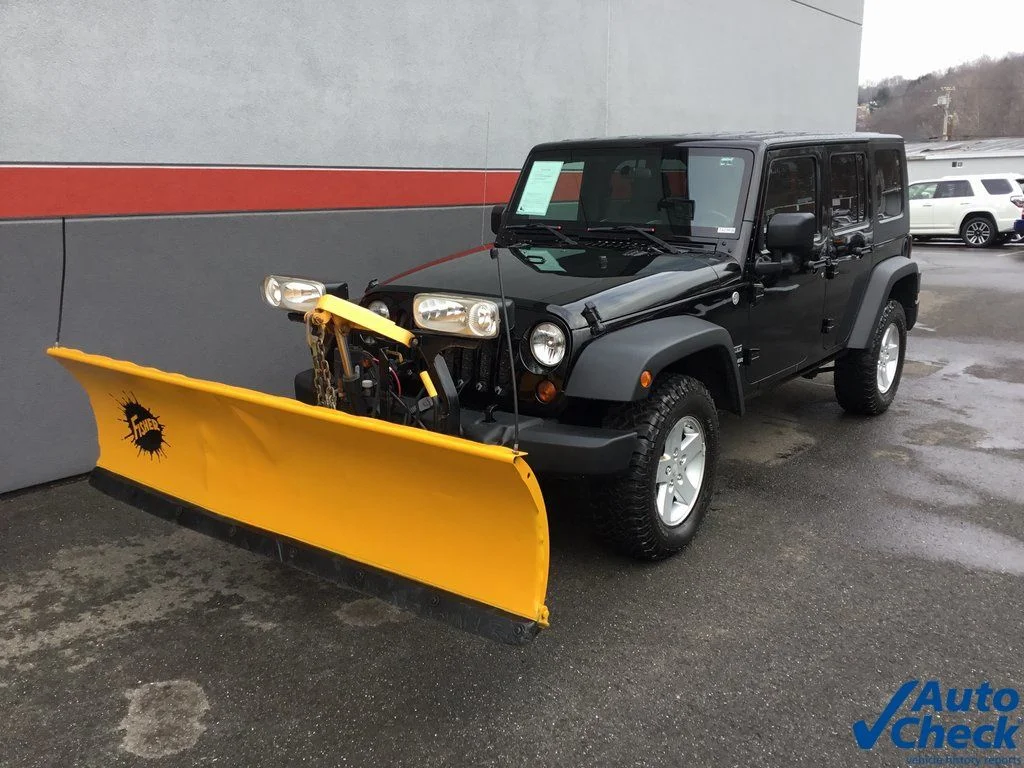 Used 2010 Black Jeep Unlimited Sport image 6