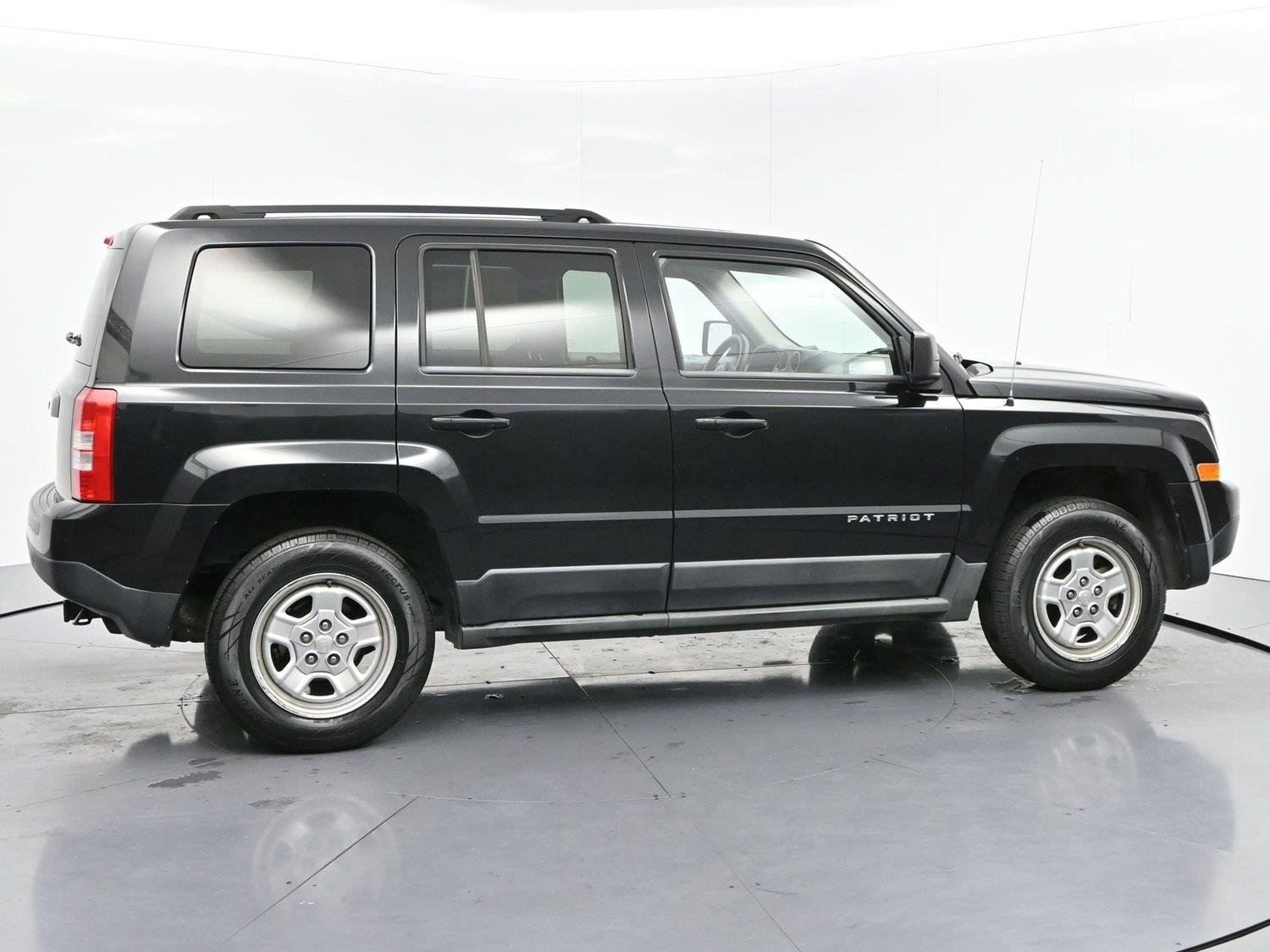 Used 2011 Brilliant Black Crystal Pearl Jeep Sport image 8