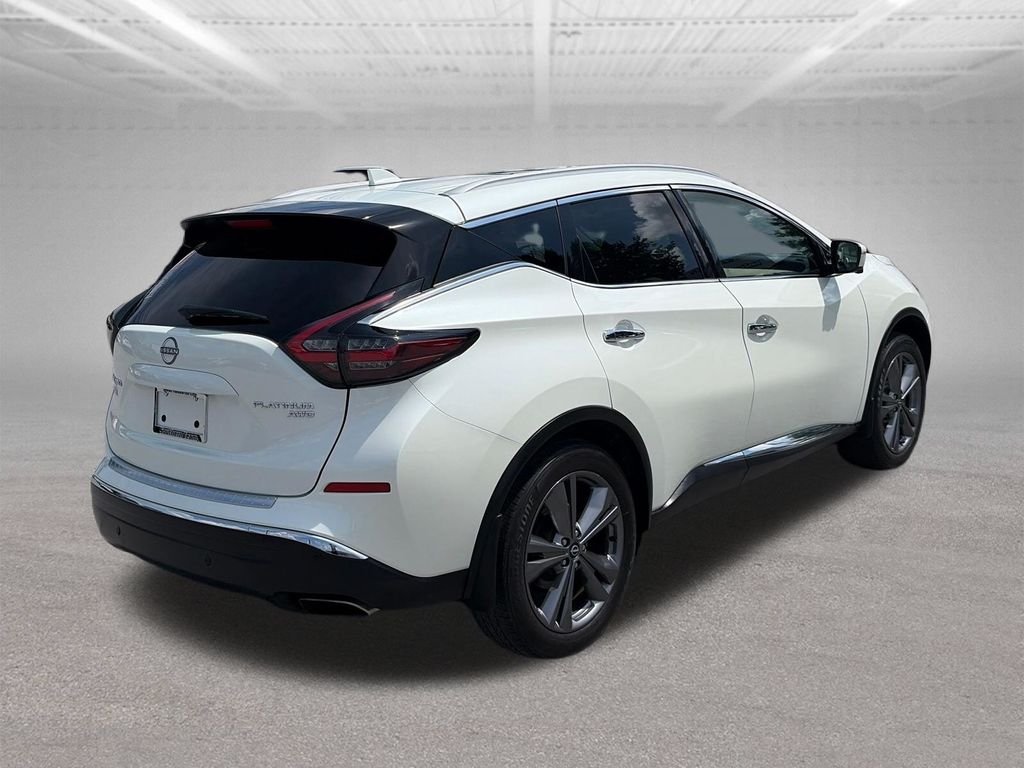Used 2024 Pearl White Nissan Platinum image 6