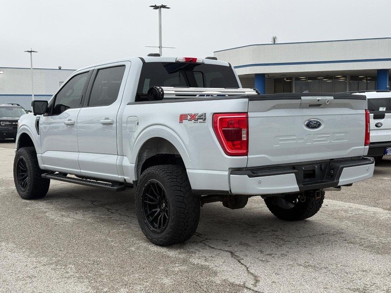 Used 2021 Space White Metallic Ford XLT 4WD SuperCrew 5.5