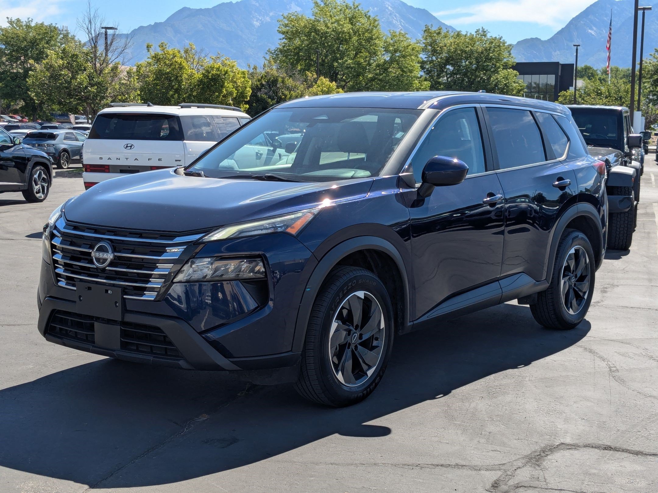 Used 2024 Deep Ocean Blue Pearl Nissan SV image 9