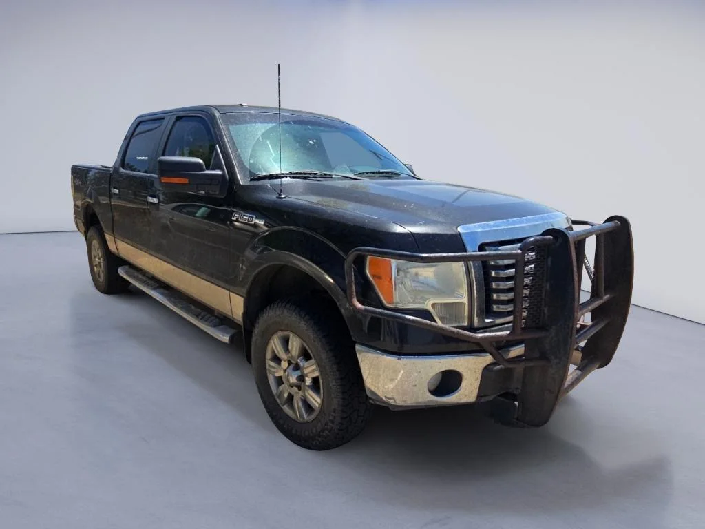 Used 2011 Tuxedo Black Metallic Ford XLT image 6
