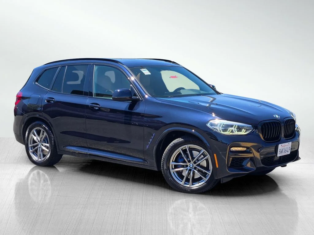 Used 2021 Black BMW M40i image 1