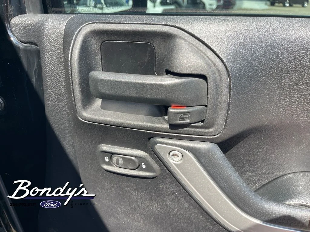 Used 2013 Black Clearcoat Jeep Unlimited Sport image 19