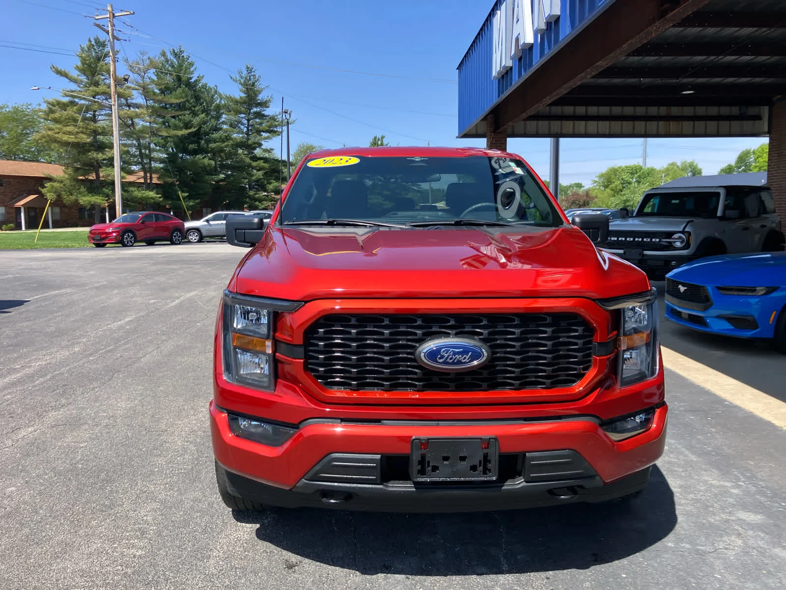 Used 2023 Hot Pepper Red Metallic Tinted Clearcoat Ford XL image 3