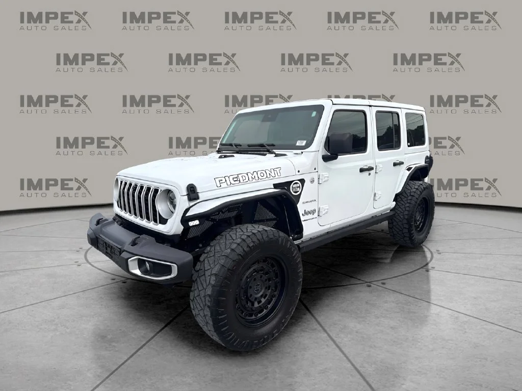 Used 2024 White Jeep Sahara image 1