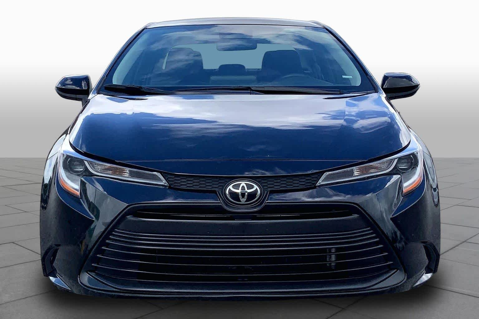 Used 2024 Midnight Black Metallic Toyota LE image 4