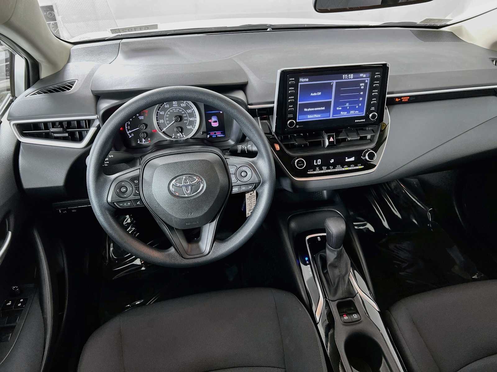 Used 2021 Super White Toyota LE image 21