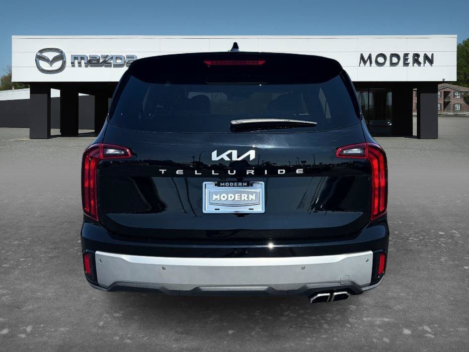 Used 2024 Ebony Black Kia S image 6