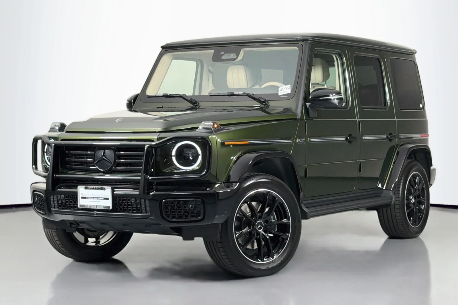 Certified Used 2025 MANUFAKTUR Olive Metallic Mercedes-Benz G 550 image 1