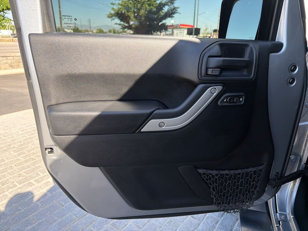 Used 2016 Silver Jeep Unlimited Sahara image 10