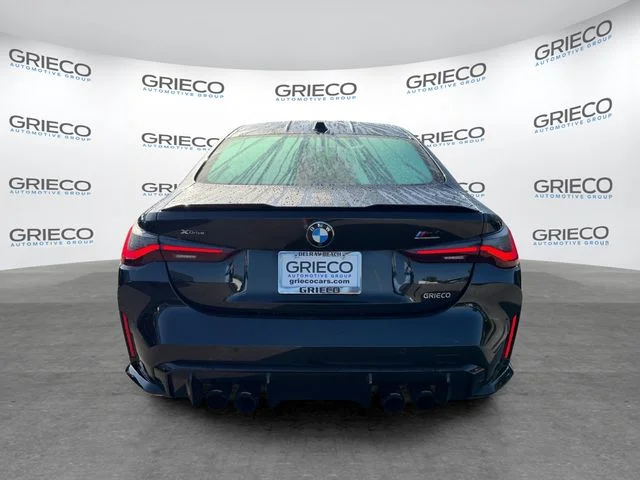 Used 2024 Black Sapphire Metallic BMW Competition image 6
