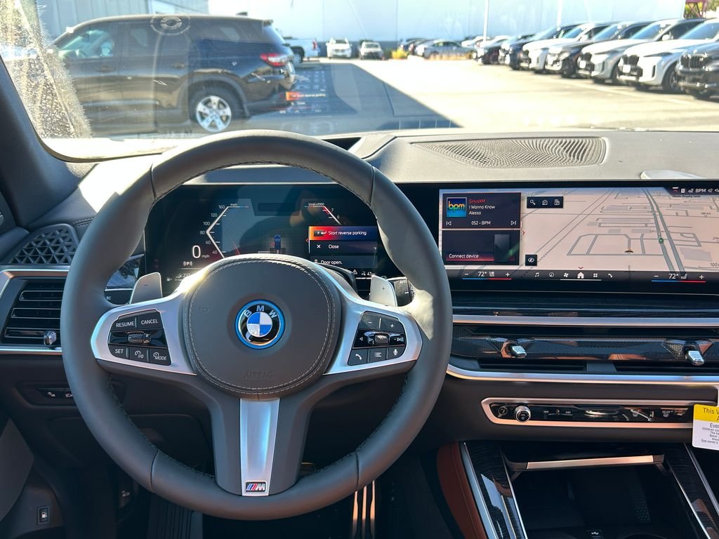 New 2026 Tanzanite Blue II Metallic BMW xDrive50e image 17