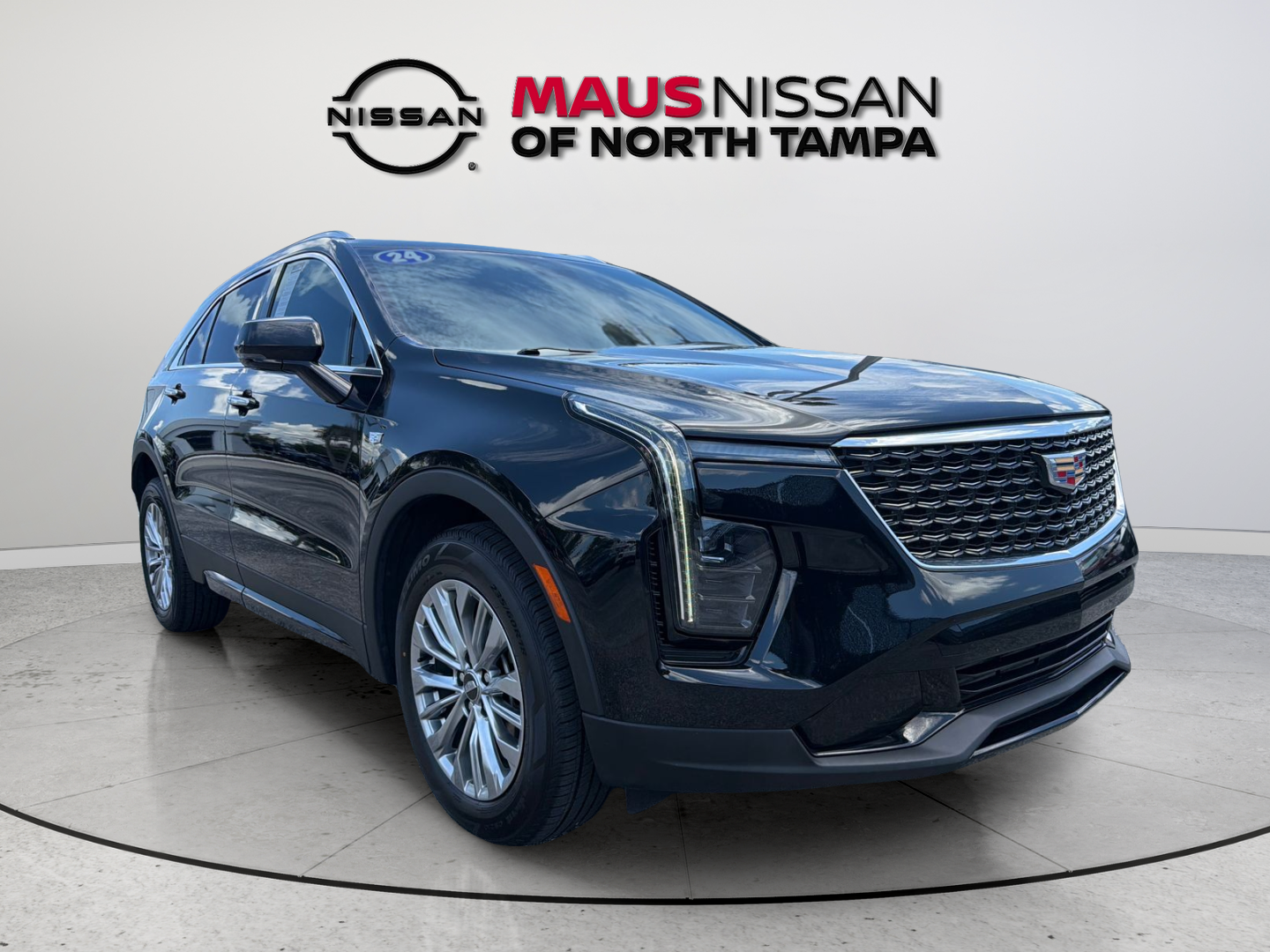 Used 2024 Black Cadillac Premium Luxury image 1
