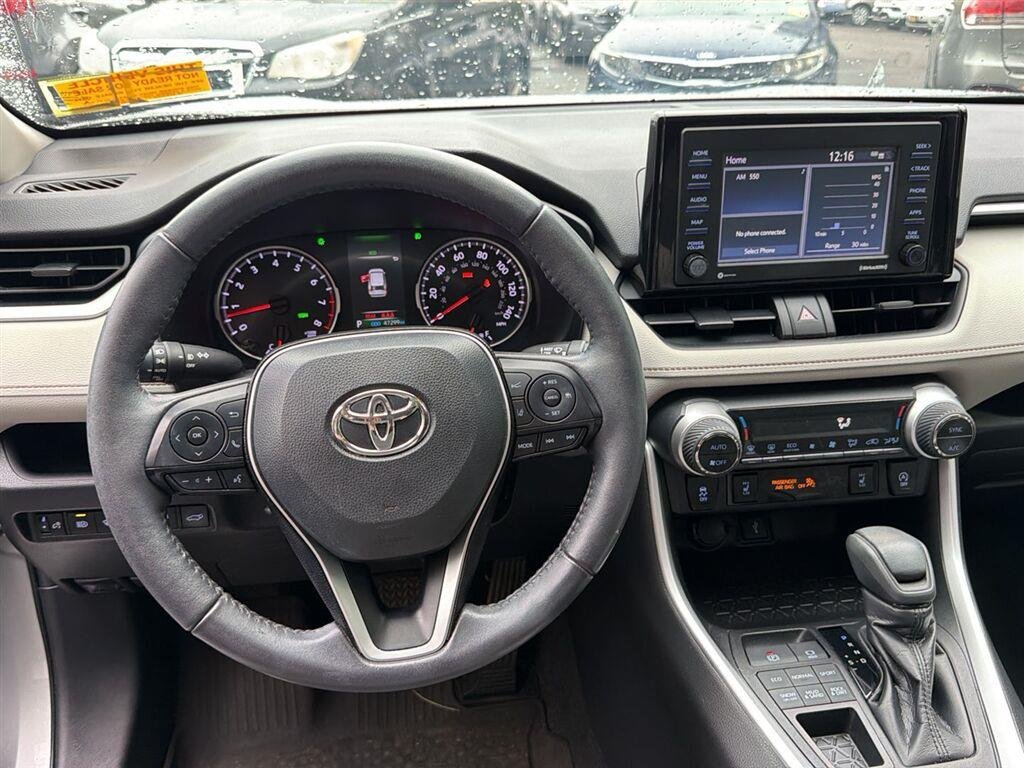 Used 2021 Silver Sky Metallic Toyota XLE image 2