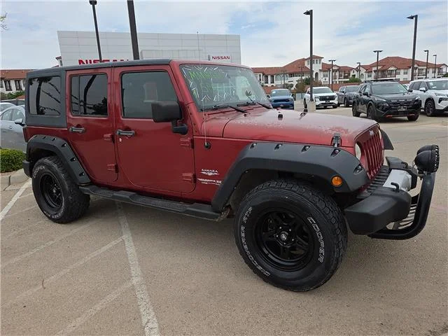 Used 2011 Red Jeep Sahara 4x4 image 6