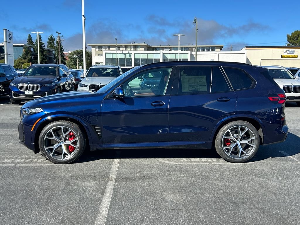 New 2026 Tanzanite Blue II Metallic BMW xDrive50e image 2