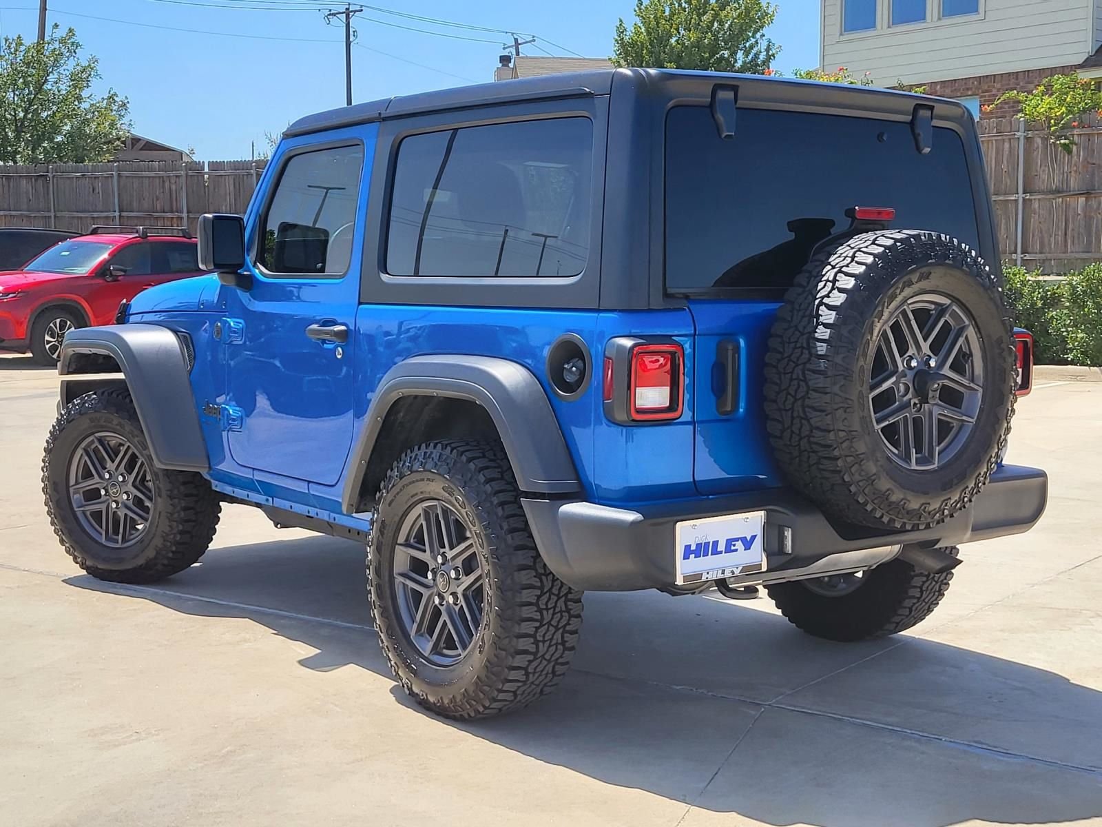 Used 2024 Hydro Blue Pearl Coat Jeep Sport S image 3