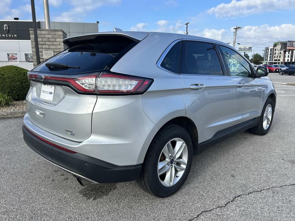 Used 2016 Ingot Silver Ford SEL image 4