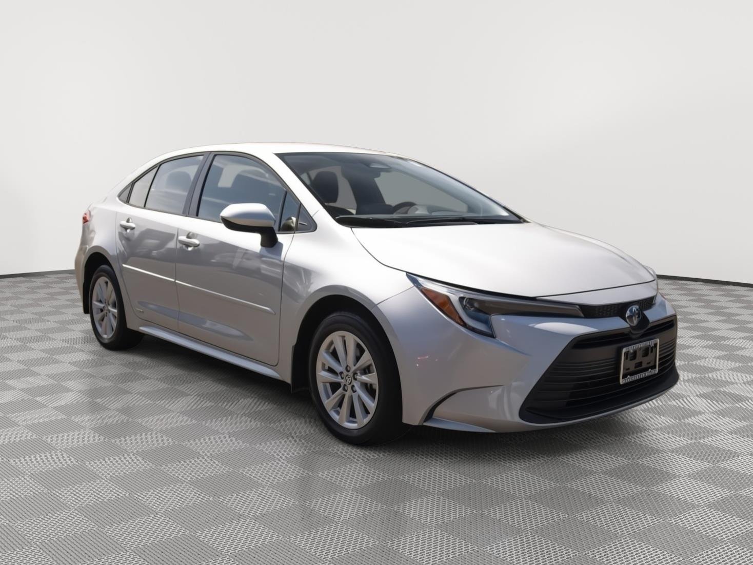 Used 2024 Classic Silver Metallic Toyota Hybrid LE image 1
