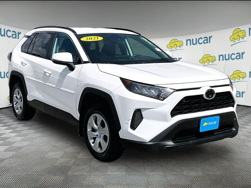 Used 2021 White Toyota LE image 1