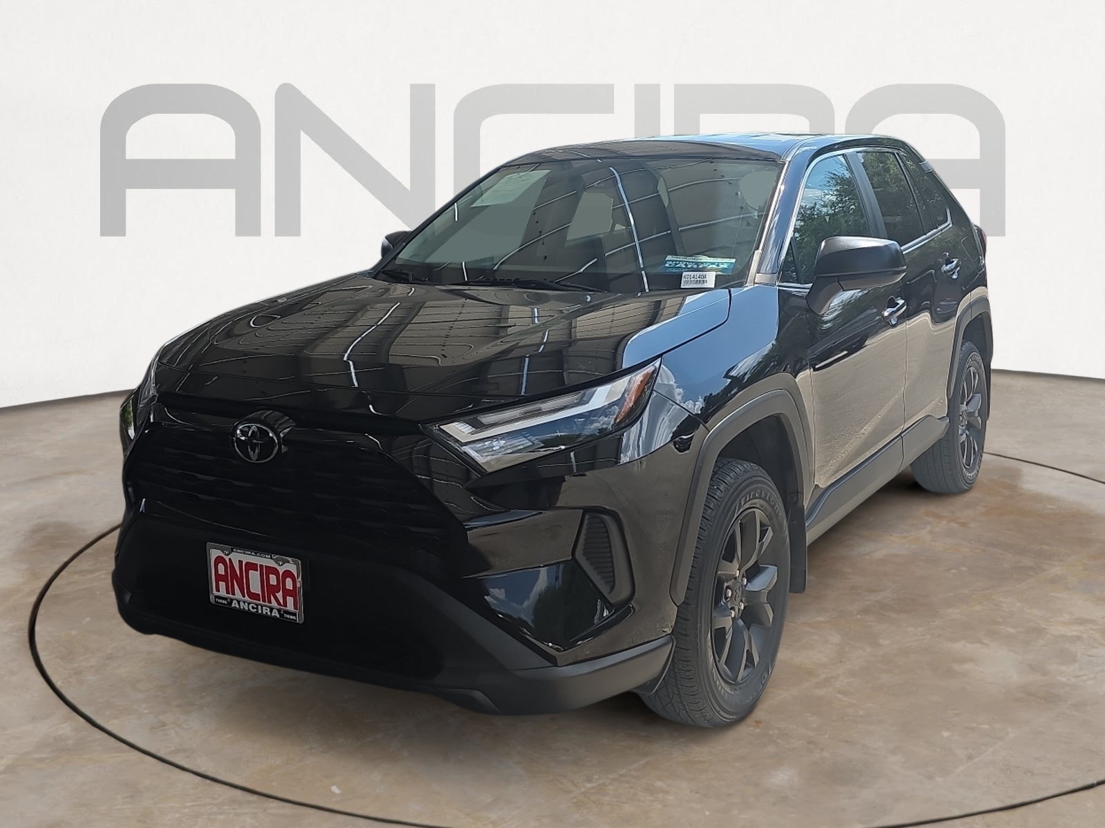 Used 2023 Midnight Black Metallic Toyota LE image 4
