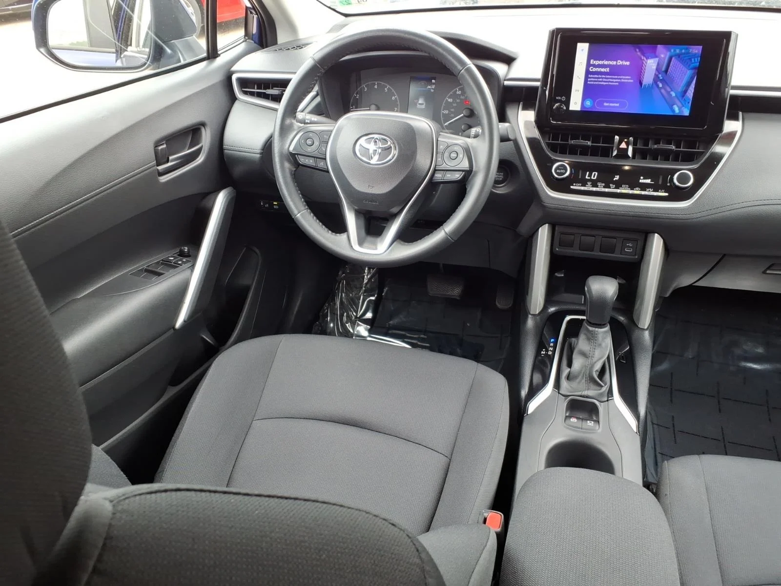Used 2024 Blue Crush Metallic Toyota LE image 4