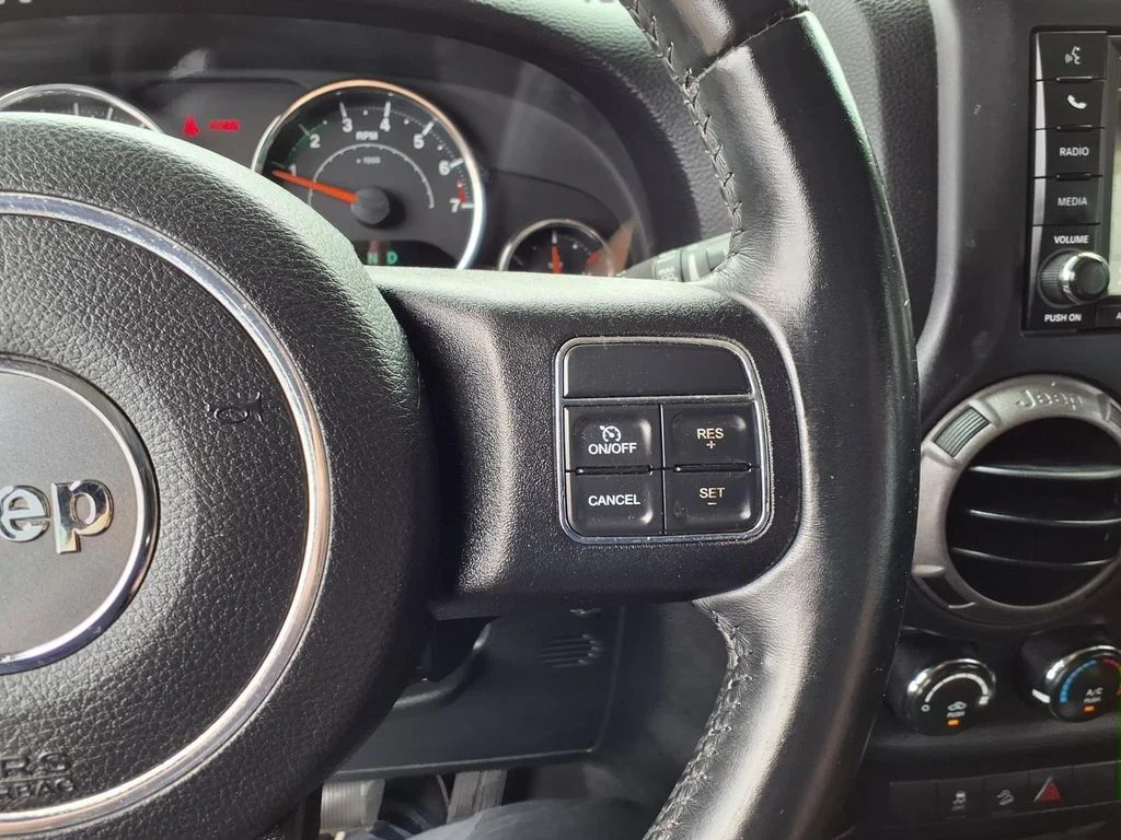 Used 2016 Blue Jeep Unlimited Sport image 15