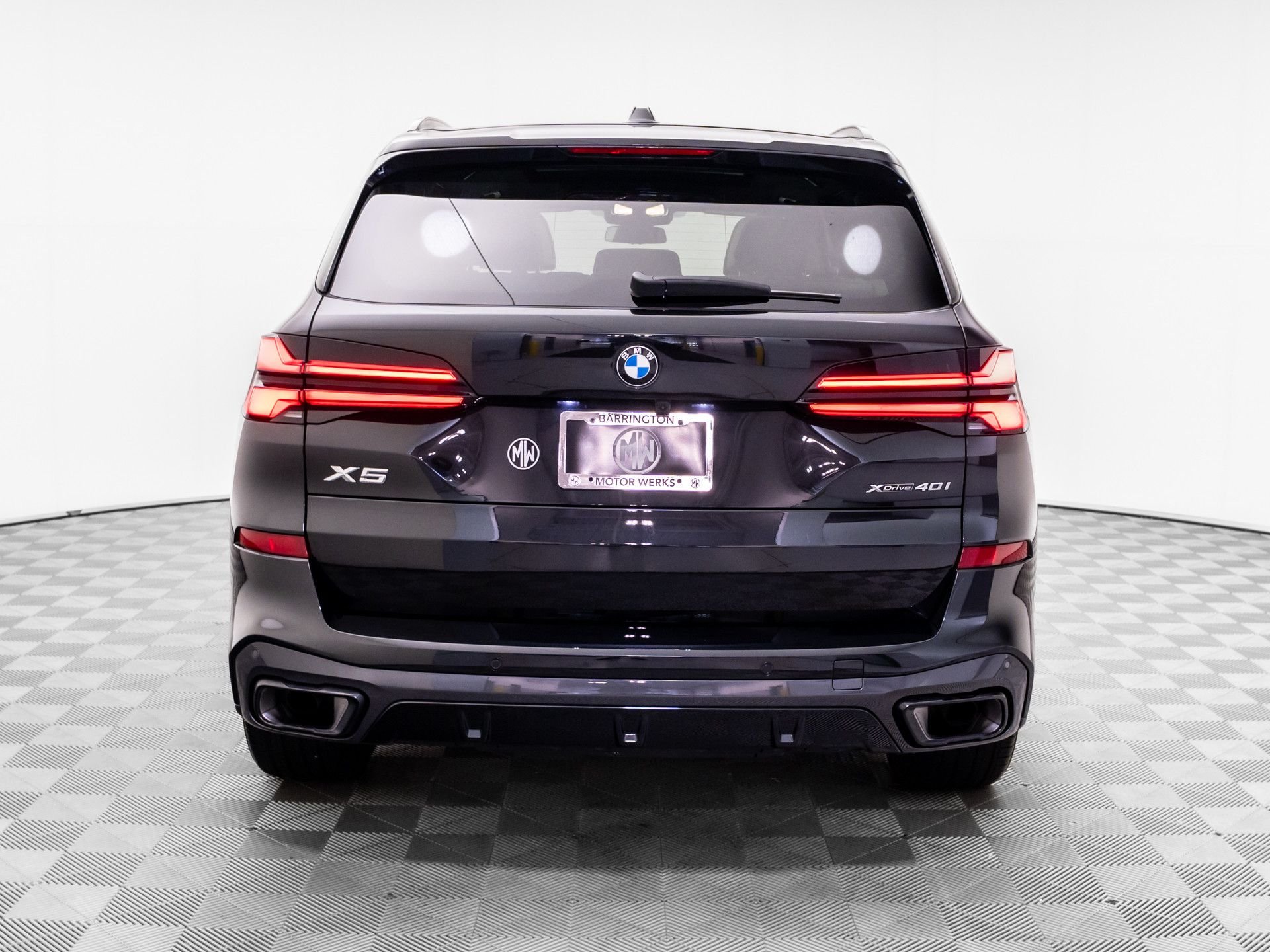 Certified Used 2024 Black Sapphire Metallic BMW xDrive40i image 4